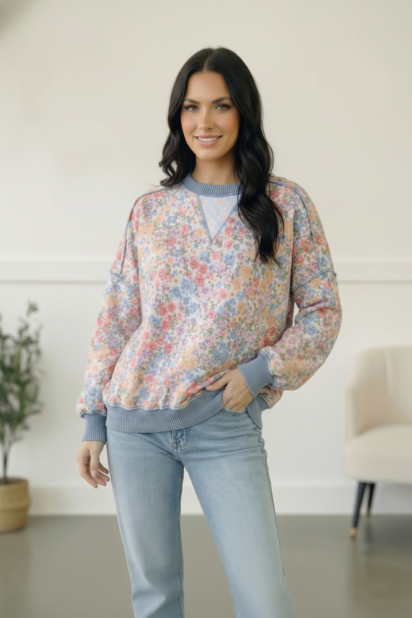 Meadow Breeze floral pullover, lightweight sweatshirt for women, floral print boutique top, blue ribbed trim sweater, relaxed fit floral top, feminine loungewear, spring floral sweatshirt, comfortable women's pullover.