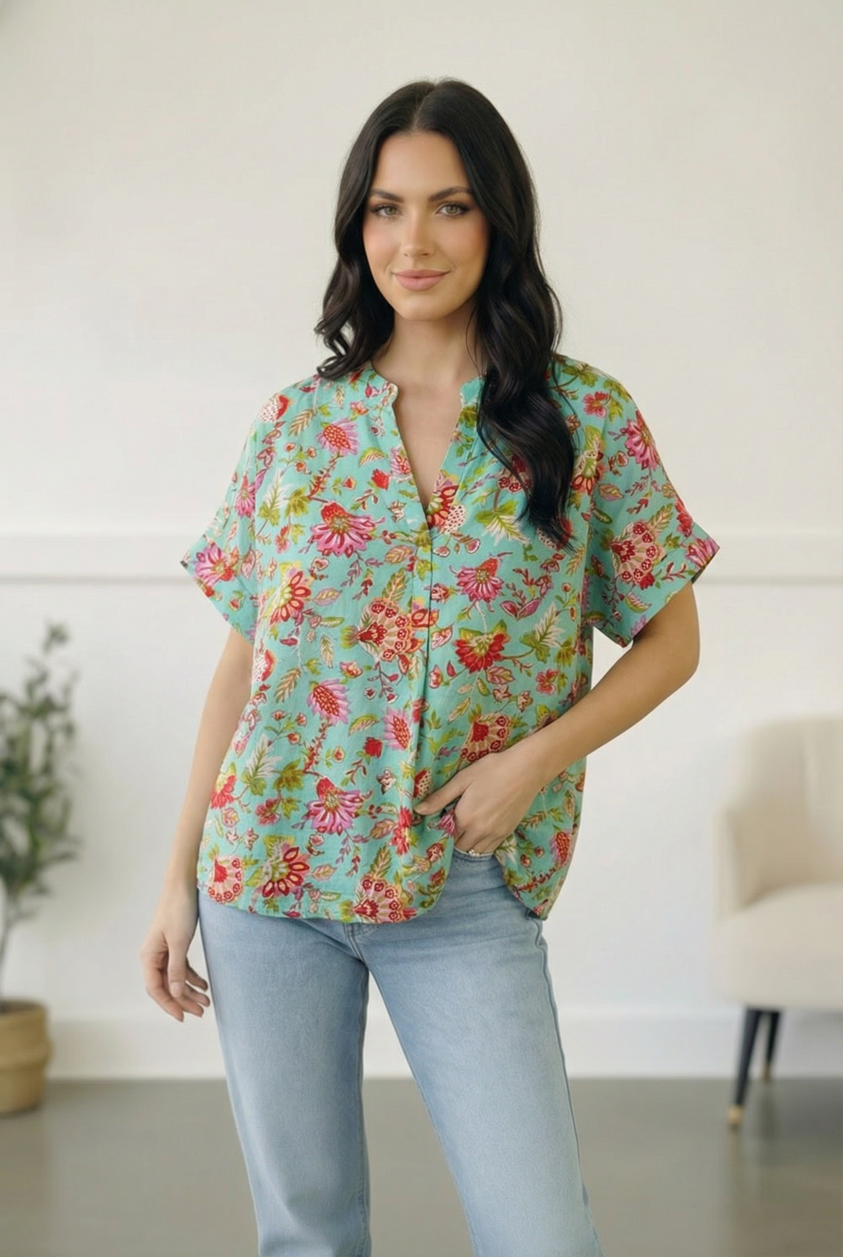 teal floral blouse, split neck top, womens flowy blouse, spring floral top, boutique summer clothing, lightweight polyester blouse, teal boho top, short sleeve floral shirt, easy wear summer tops
