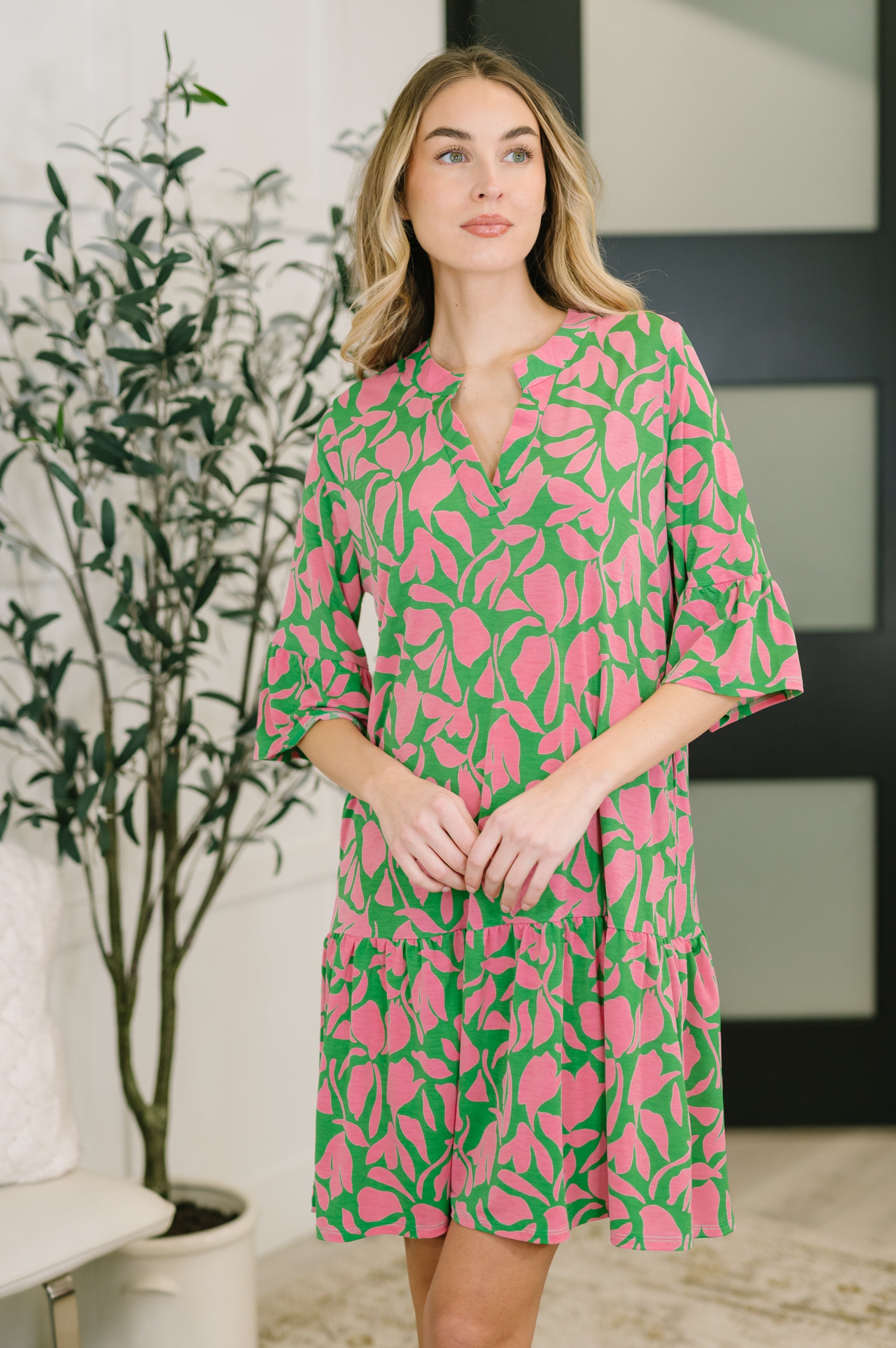 Emerald floral dress, Bulgari fabric dress, wrinkle-resistant women's clothing, tiered floral dress with pockets, cooling summer dress, travel-friendly modest dress, V-neck ruffle sleeve dress.