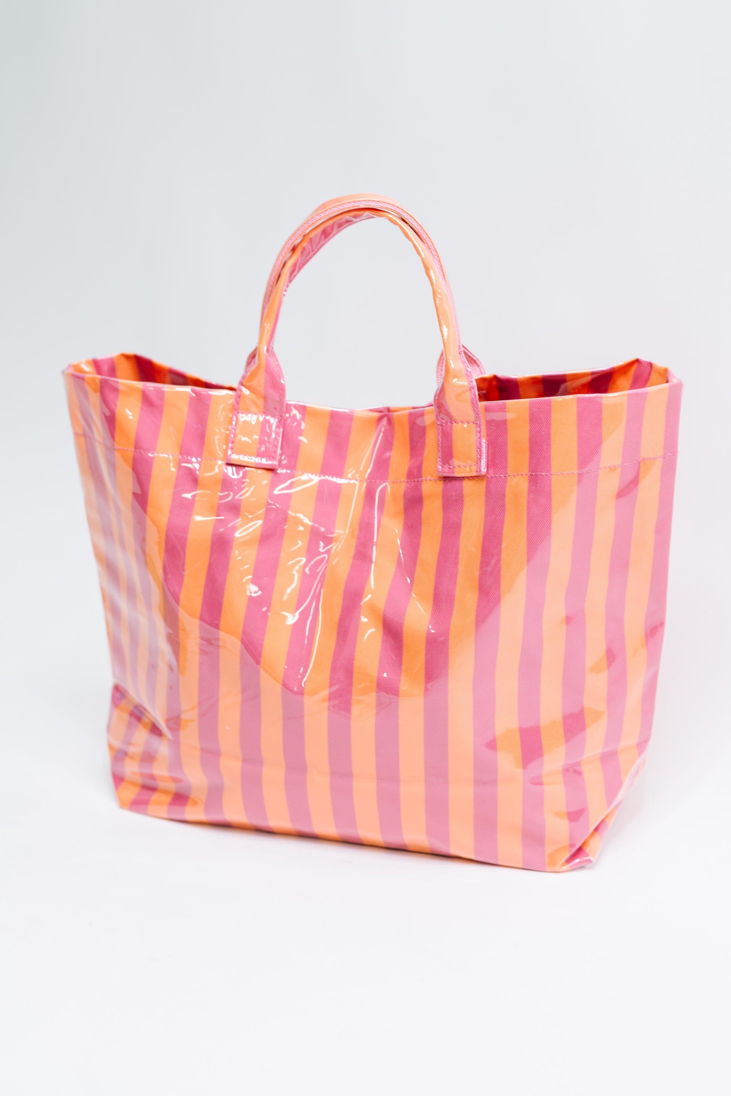 Pink and orange tote bag, glossy vinyl bag, striped statement tote, colorblock handbag, waterproof vinyl shopper, bold fashion accessories, vibrant daily tote, Fabknits bag.