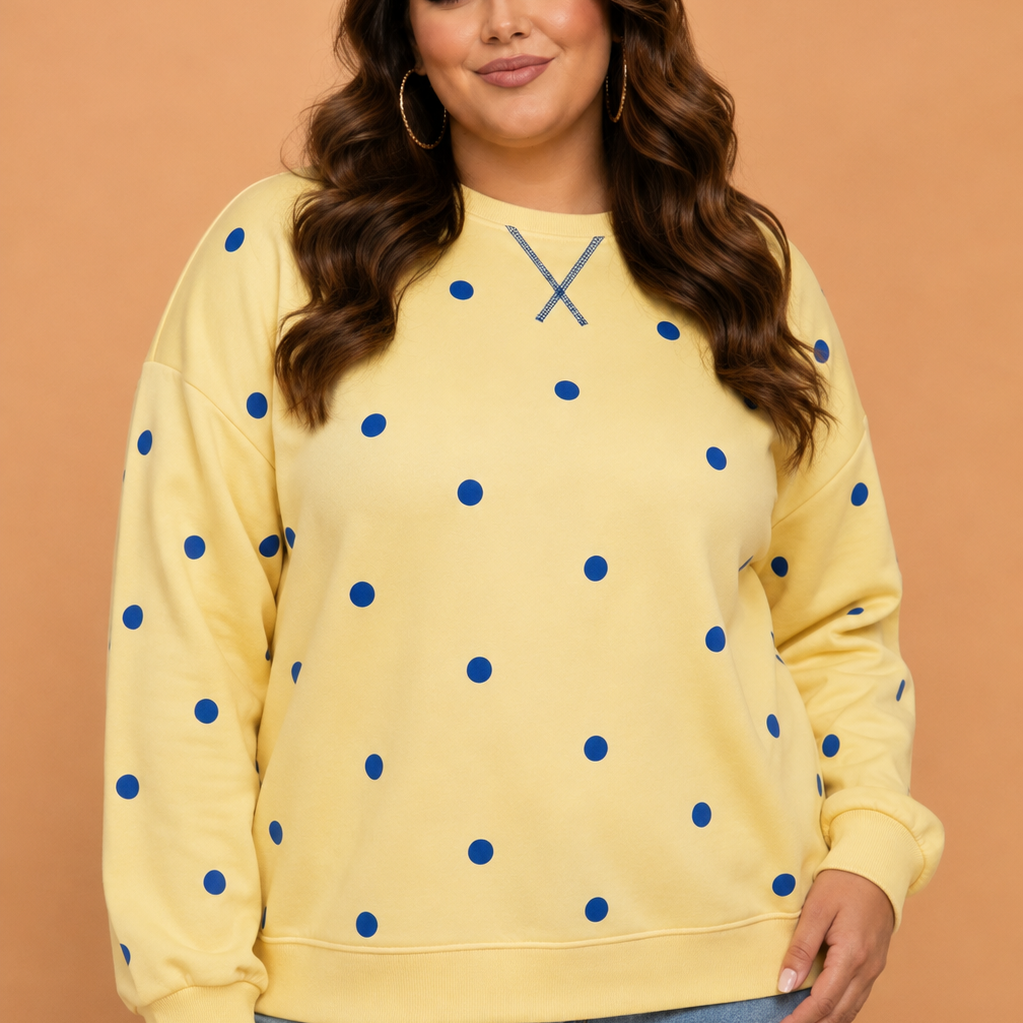 Plus size sweatshirt, polka dot pullover, women’s casual tops, long sleeve sweatshirt, split hem top, cozy plus size fashion, trendy plus size clothing, yellow polka dot top.