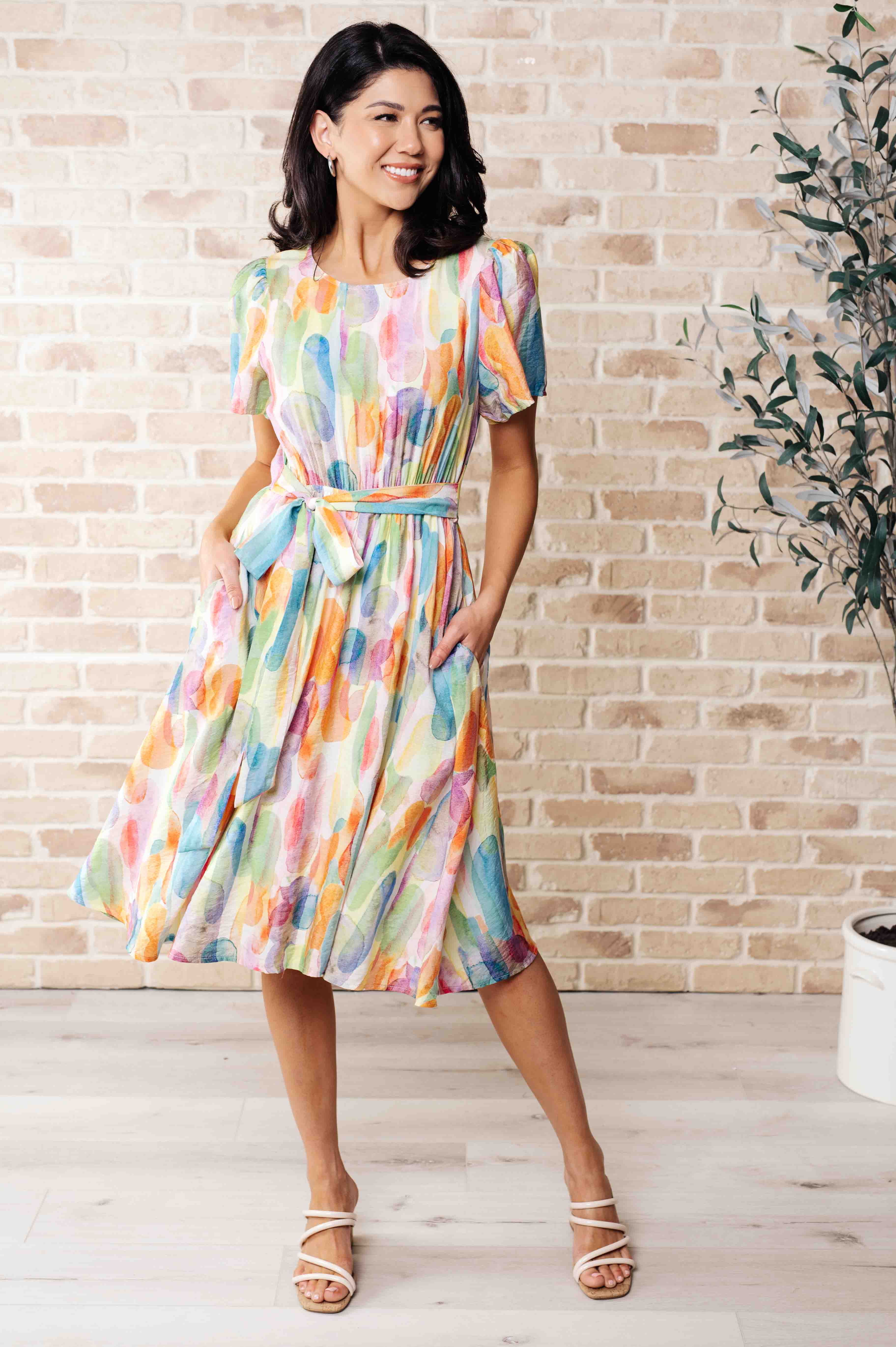 watercolor midi dress, abstract print dress, tie-waist casual dress, whimsical puff sleeve dress, woven round neck dress, colorful summer dress, flattering waistline dress, Young Wild Free dress