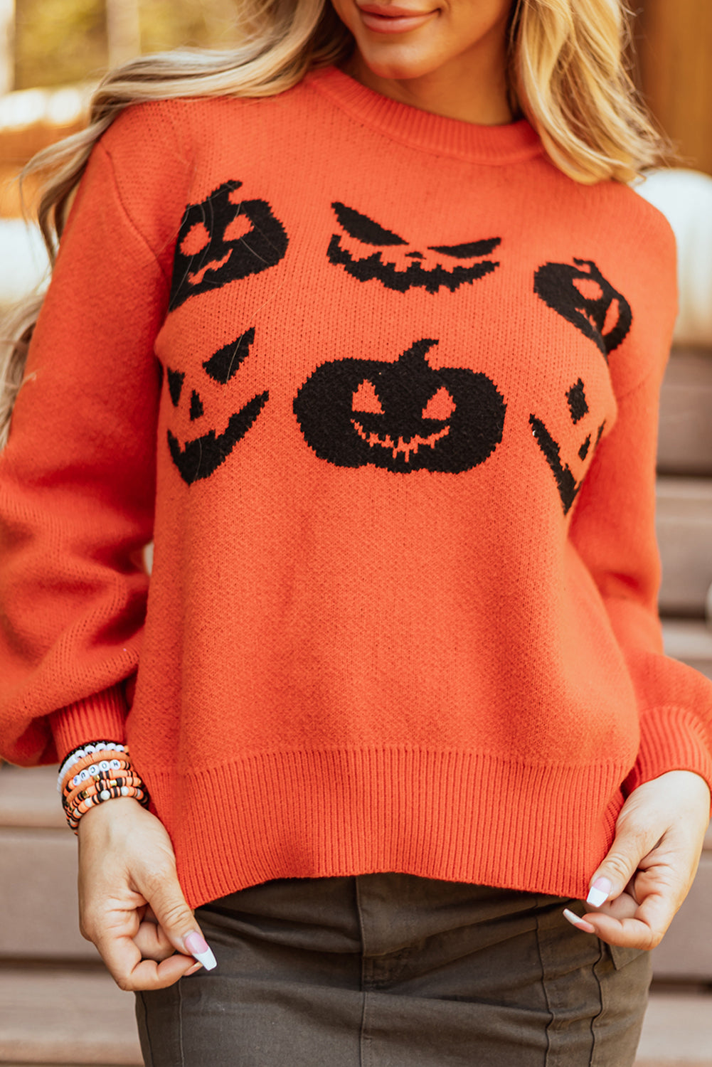Halloween sweater, pumpkin knit, Jack-o'-lantern top, fall fashion, drop shoulder sweater, orange festive knit, women's Halloween apparel, spooky season outfit.