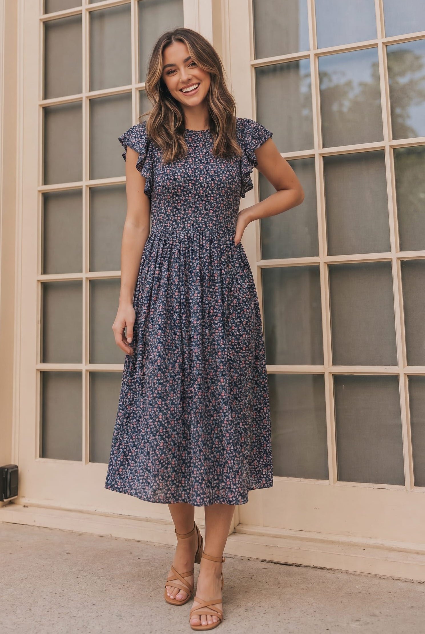 Black floral midi dress, smocked waist dress, ditsy floral print, flutter sleeve dress, tiered midi skirt, modest floral dress, women's dress with pockets, wedding guest dress, brunch outfit ideas.