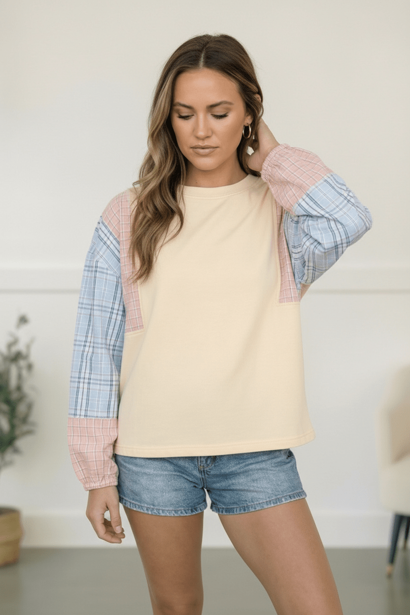 Oatmeal pullover, plaid patchwork top, boutique women's clothing, mixed print sweatshirt, casual long sleeve top, comfortable lounge wear, patchwork sleeves top.
