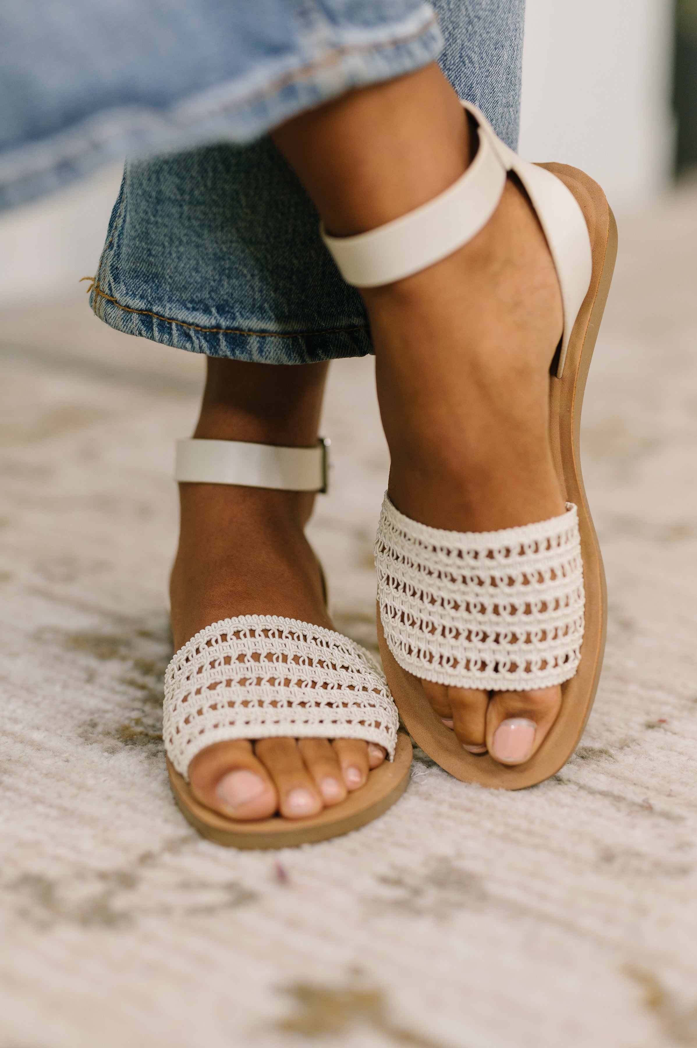 Bone flat sandals, woven summer shoes, ankle strap sandals, women's casual footwear, neutral sandals, PU leather flats, comfortable summer sandals, chic beach footwear.