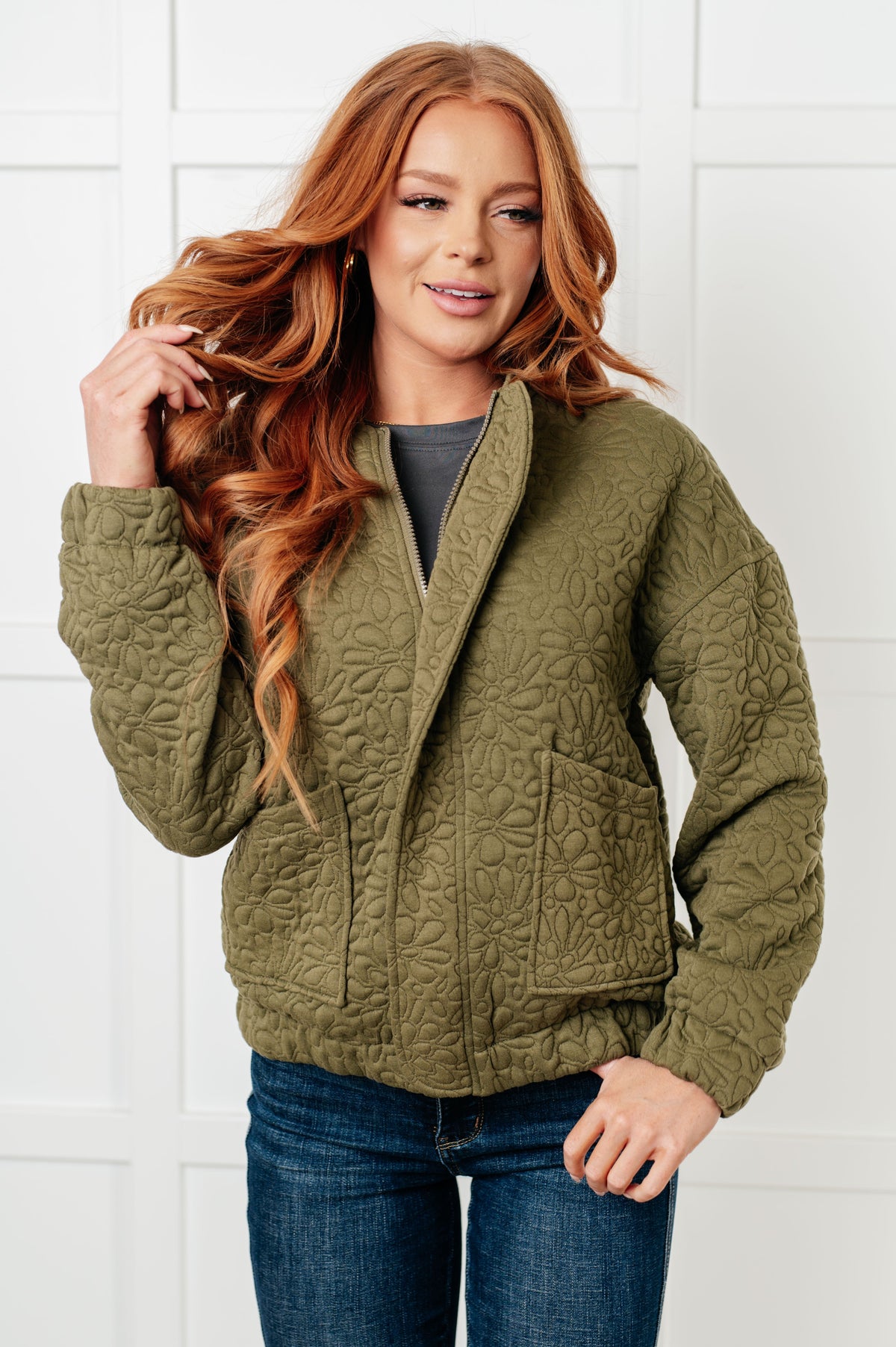 Women’s quilted zip up jacket