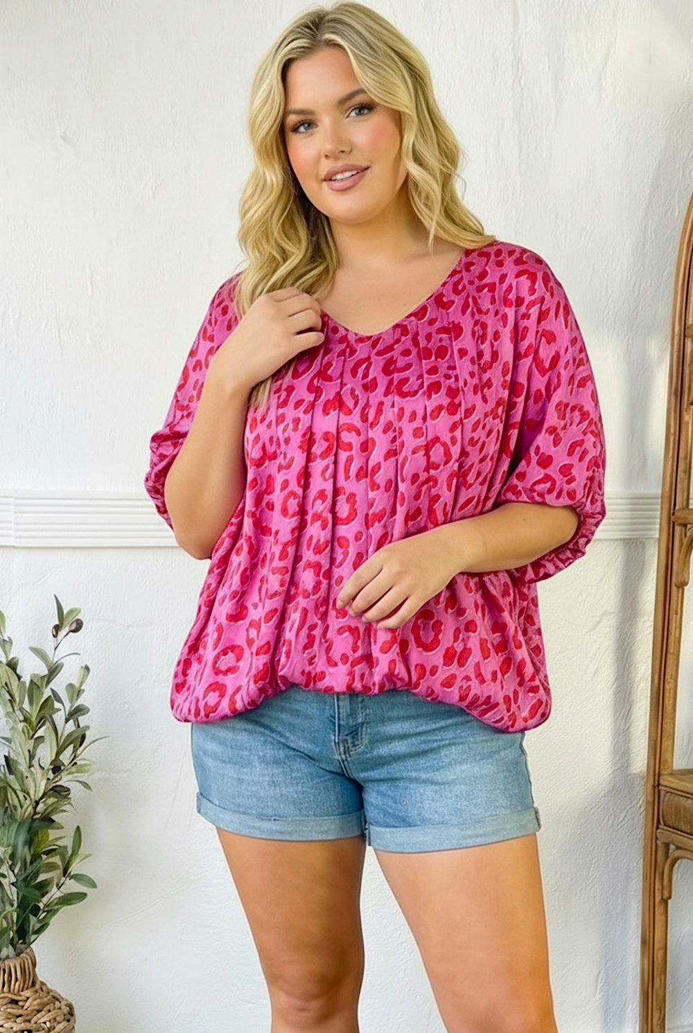 hot pink leopard top, bubble hem blouse, pink animal print shirt, women's V-neck blouse, pleated pink top, statement blouse, boutique fashion, pink leopard print, bubble top