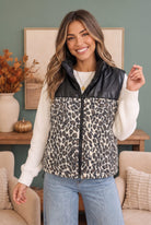 leopard print vest, women's puffer vest, faux leather vest, animal print fleece, fall layering pieces, chic winter outerwear, sleeveless puffer jacket