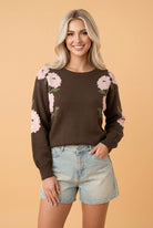 floral sweater, drop shoulder pullover, women's knitwear, off the shoulder sweater, winter fashion, boho floral knit, brown floral top, feminine winter layers
