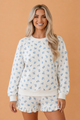 Floral lounge set, ruffle hem shorts, long sleeve loungewear, women's two-piece set, ditsy floral pajamas, cozy loungewear for women, spring floral set, feminine lounge set