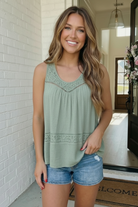 Sage green tank top, lace trim sleeveless top, flowy summer blouse, boho tank top, women’s sage clothing, breezy casual top, feminine lace blouse.
