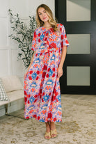 floral poplin dress, bow detail dress, dress with pockets, feminine floral dress, gathered waist dress, structured midi dress, spring floral fashion, Art of Loving dress