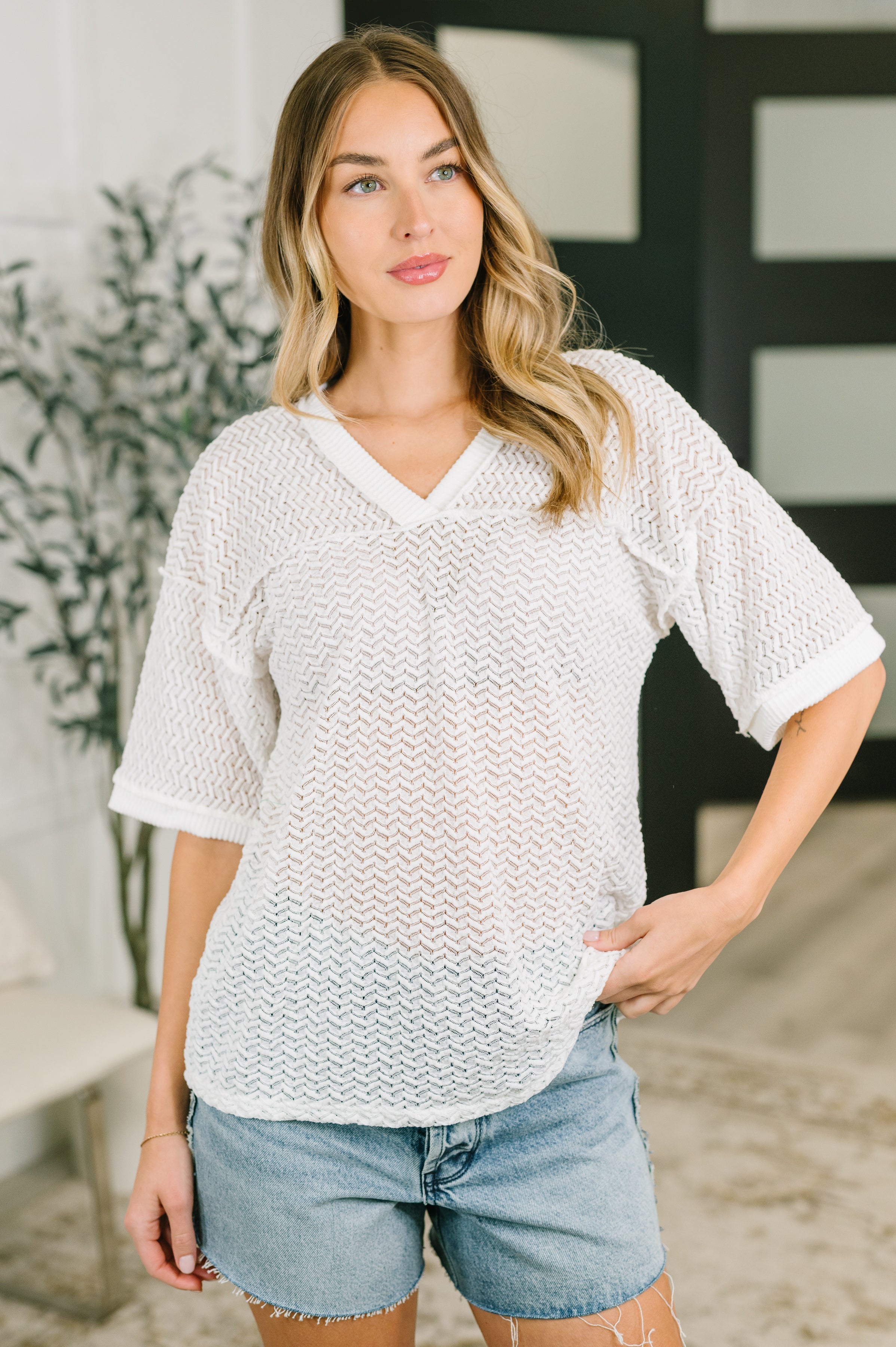 textured knit top, sheer oversized shirt, women’s V-neck knit, relaxed fit top, drop shoulder sweater, exposed seam fashion, summer layering top, white textured top, cable rib knit