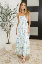 floral maxi dress, tiered sun dress, blue and ivory floral dress, bustier summer dress, garden party outfit, lightweight woven dress, feminine tiered maxi, wedding guest dress