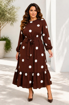 Brown polka dot midi dress with long sleeves, elastic cuffs, and ruffled hem.