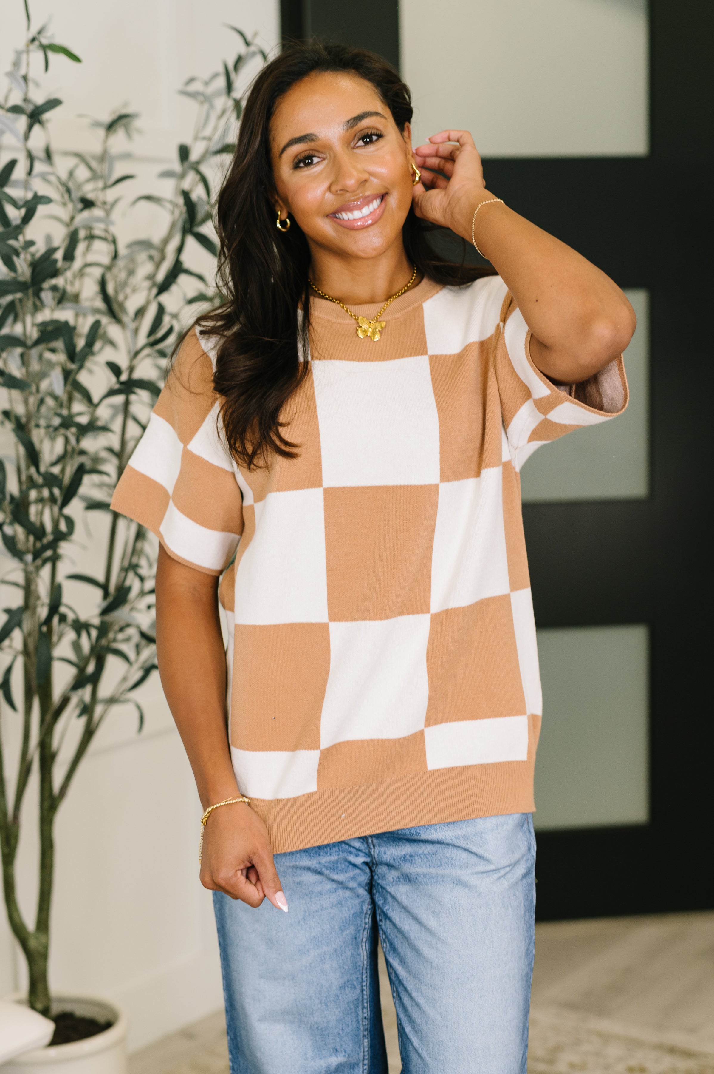 short sleeve sweater, checkerboard knit top, relaxed fit sweater, cafe check top, soft knit streetwear, women's casual sweater, oversized checkered top, breathable knitwear
