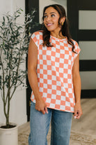 Orange checkered top, French Terry sleeveless shirt, women’s orange casual top, stretch fabric sleeveless top, checkered boutique top, summer layering essentials, orange round neck top.