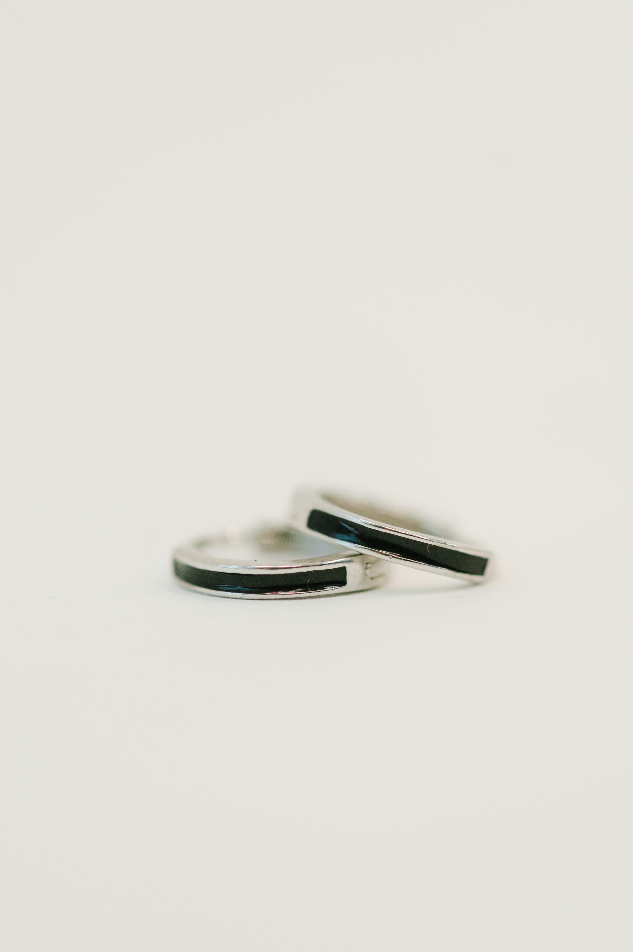 Sterling silver huggies, black enamel earrings, 925 silver hoops, hypoallergenic jewelry, minimalist huggie hoops, everyday silver earrings, nickel-free jewelry.