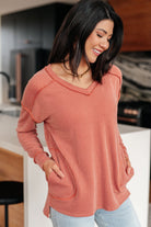 Ribbed knit top, V-neck tunic, women's top with pockets, exposed seam sweater, casual loungewear, stepped hem shirt, cozy fall fashion, oversized ribbed knit.
