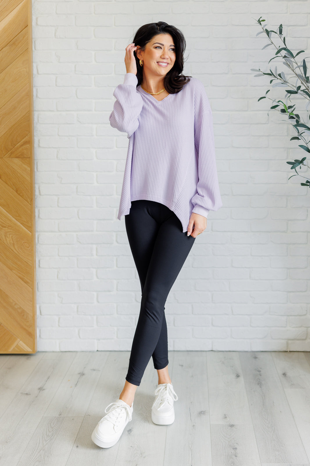 Lavender v-neck top, waffle knit tunic, asymmetrical hem top, women's cozy lounge top, drop shoulder sweater, lavender knitwear, chic casual top.