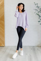 Lavender v-neck top, waffle knit tunic, asymmetrical hem top, women's cozy lounge top, drop shoulder sweater, lavender knitwear, chic casual top.