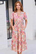 floral midi dress, smocked waist dress, garden party dress, watercolor floral print, tiered midi dress, wedding guest dress, spring brunch outfit, women’s pocketed dress