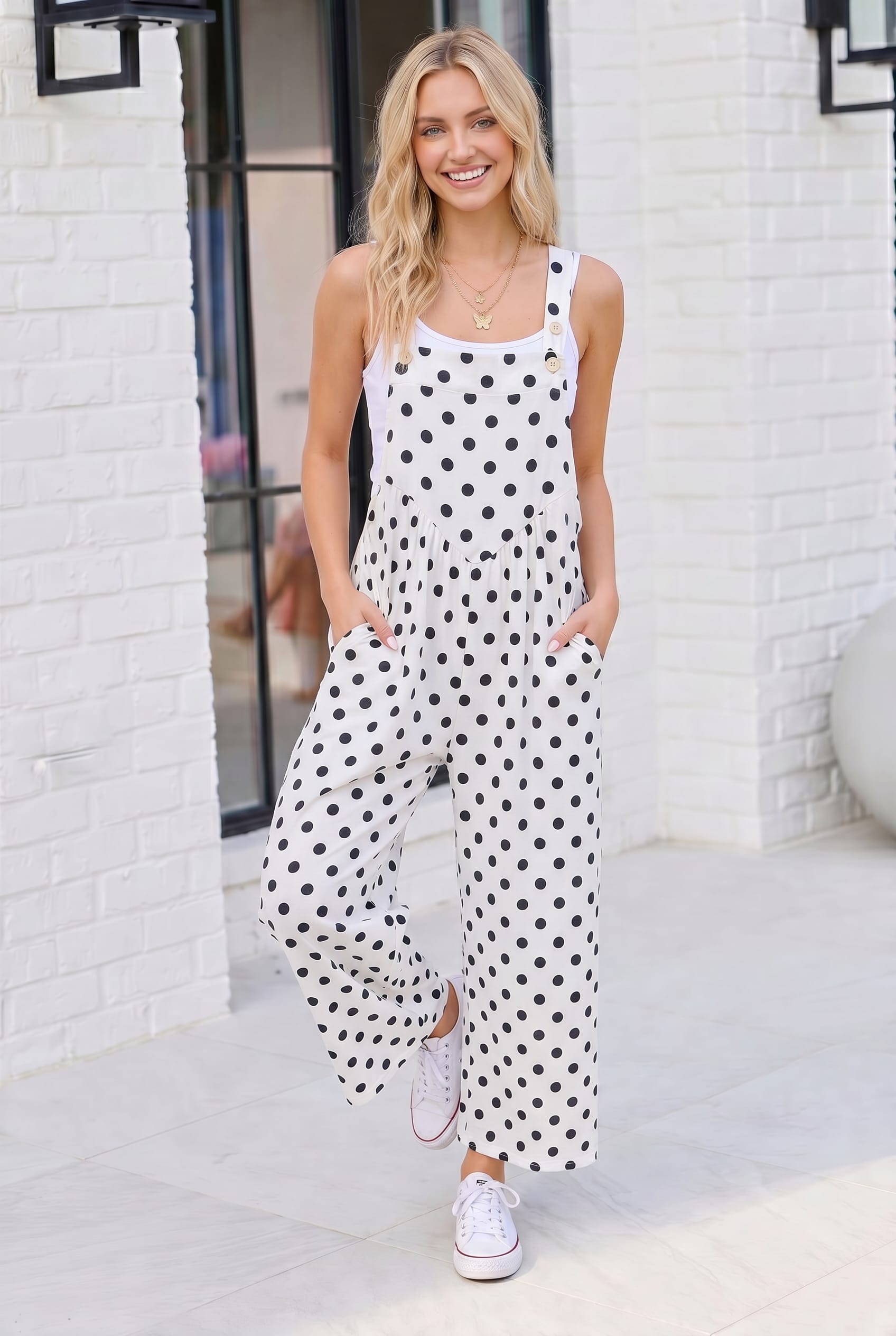 Polka dot jumpsuit, wide leg overalls, black and white jumpsuit, summer overalls, women's fashion jumpsuits, casual wide leg pants, playful polka dot outfit.