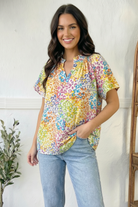 Multicolor blouse, leopard print top, women's colorful tops, breezy summer blouse, notched neck shirt, vibrant casual wear, stretchy printed top, lightweight flowy blouse, FabKnits fashion.