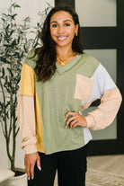 Colorblock top, jersey terry shirt, V-neck casual top, women's relaxed fit top, exposed seam top, fall fashion, trendy loungewear, soft long sleeve top.