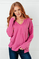Magenta ribbed top, notch neck sweater, women’s cozy knit top, drop shoulder long sleeve, pink ribbed shirt, trendy loungewear, exposed seam top, functional pocket shirt, FabKnits clothing.