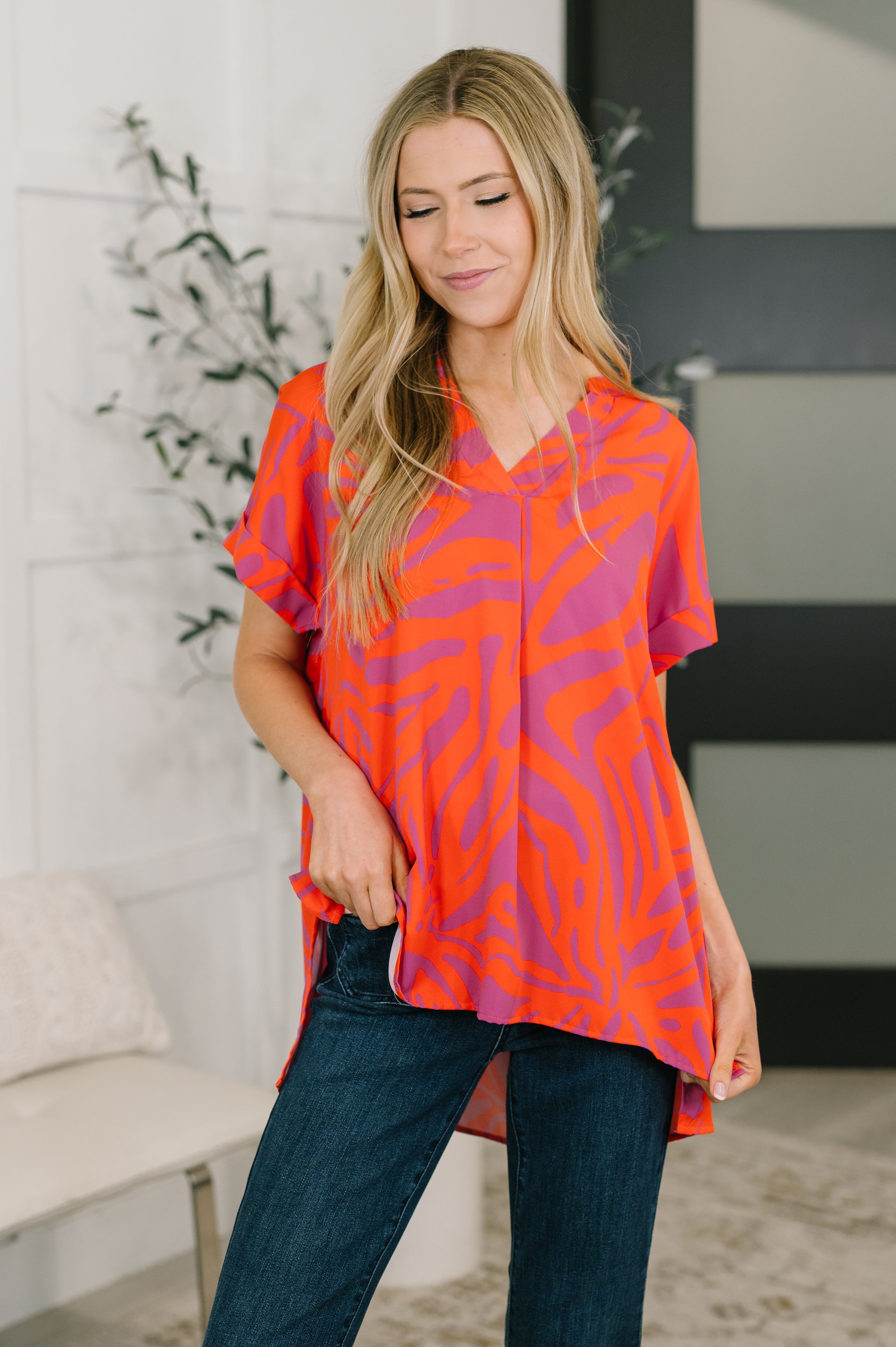 Abstract print blouse, split neck top, poplin woven blouse, dolman sleeve top, women's structured top, vibrant office wear, modern stepped hem blouse, pink and orange abstract shirt.