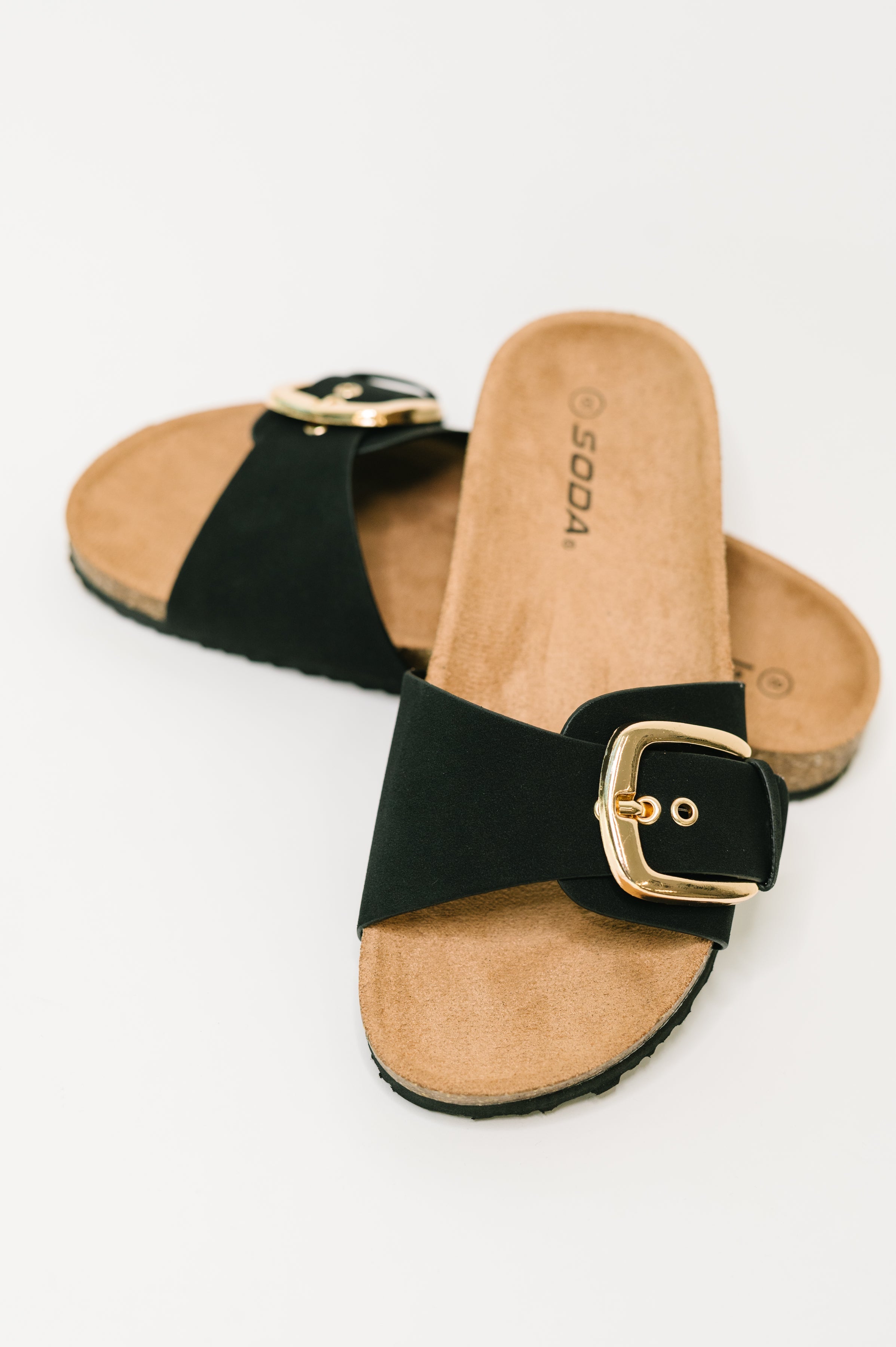 Black slip-on sandals, women's buckle slides, cork sole sandals, nubuck leather slides, gold buckle footwear, comfortable summer sandals, casual chic slides, Fabknits footwear.
