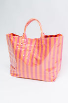 Pink and orange tote bag, glossy vinyl bag, striped statement tote, colorblock handbag, waterproof vinyl shopper, bold fashion accessories, vibrant daily tote, Fabknits bag.