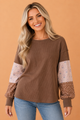 Waffle knit top, floral patchwork shirt, boho long sleeve, colorblock pullover, women’s transitional fashion, floral sleeve top, casual chic apparel, brown waffle knit.