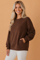 textured sweatshirt, women's drop shoulder pullover, oversized pocket sweatshirt, chocolate brown pullover, cozy loungewear, casual textured top, round neck sweatshirt women