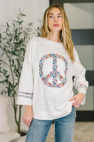 boho sweatshirt, floral peace sign top, french terry pullover, women's graphic sweatshirt, retro floral top, peace sign appliqué, boutique fashion, relaxed fit top