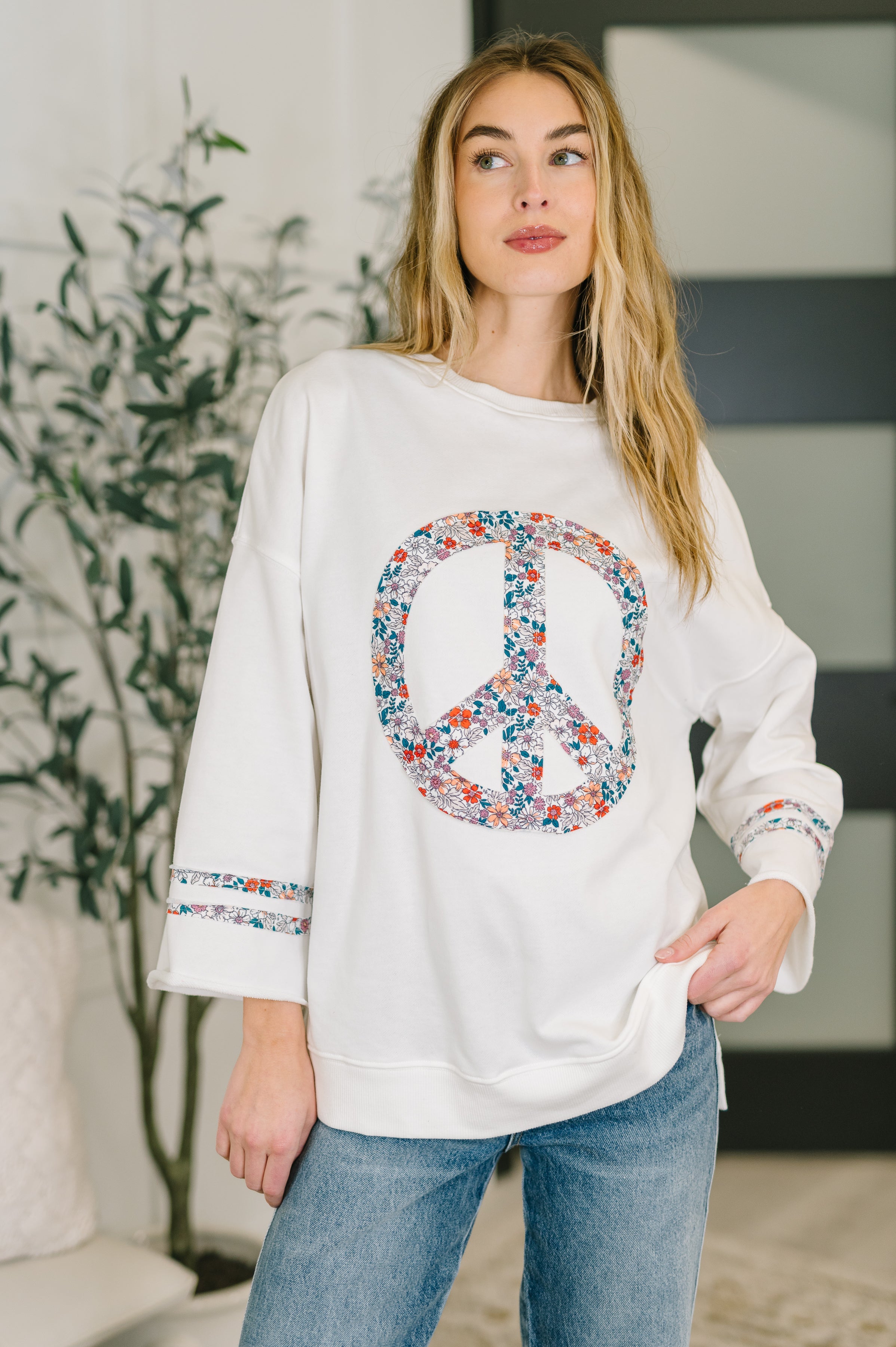 boho sweatshirt, floral peace sign top, french terry pullover, women's graphic sweatshirt, retro floral top, peace sign appliqué, boutique fashion, relaxed fit top