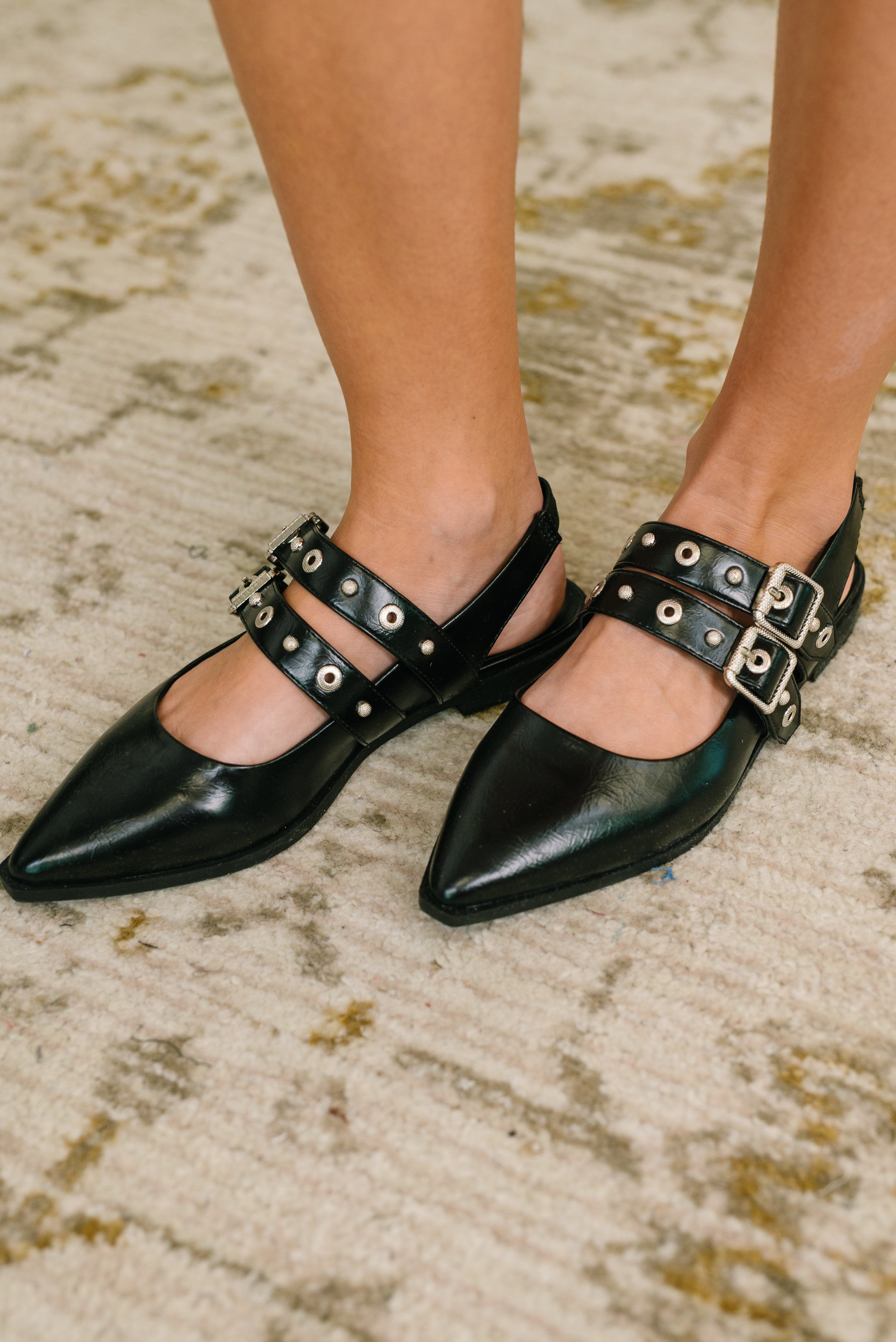 Black slingback flats, pointy toe flats, buckle shoes, studded flats, faux leather slingbacks, edgy black footwear, women's pointed toe shoes, rocker chic flats.