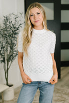 Textured knit top, puff sleeve sweater, white short sleeve knit, dimensional weave top, women's sophisticated casual, ribbed hem sweater, stretchy knit apparel.