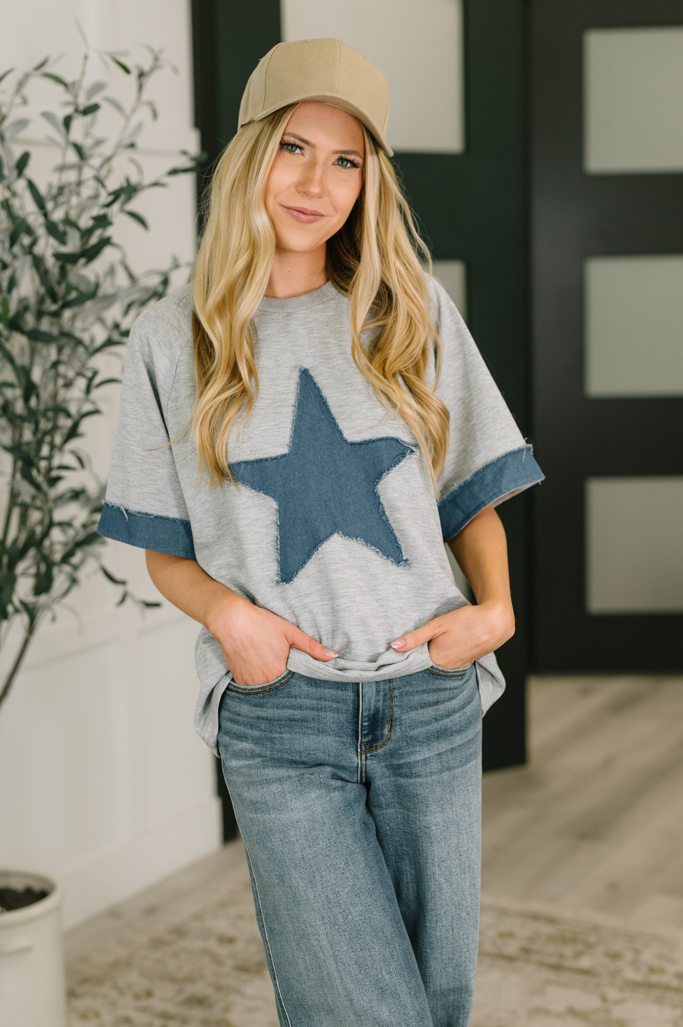 Women’s star top, distressed applique shirt, French terry sweatshirt, raglan sleeve fashion, raw edge boutique top, star graphic tee, effortless casual wear, trendy star clothing.