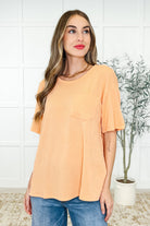 Apricot bliss tee, cable ribbed knit top, women's pocket tee, lightweight summer shirt, peach knit top, casual side slit tee, summer coral fashion, breathable women's basics.