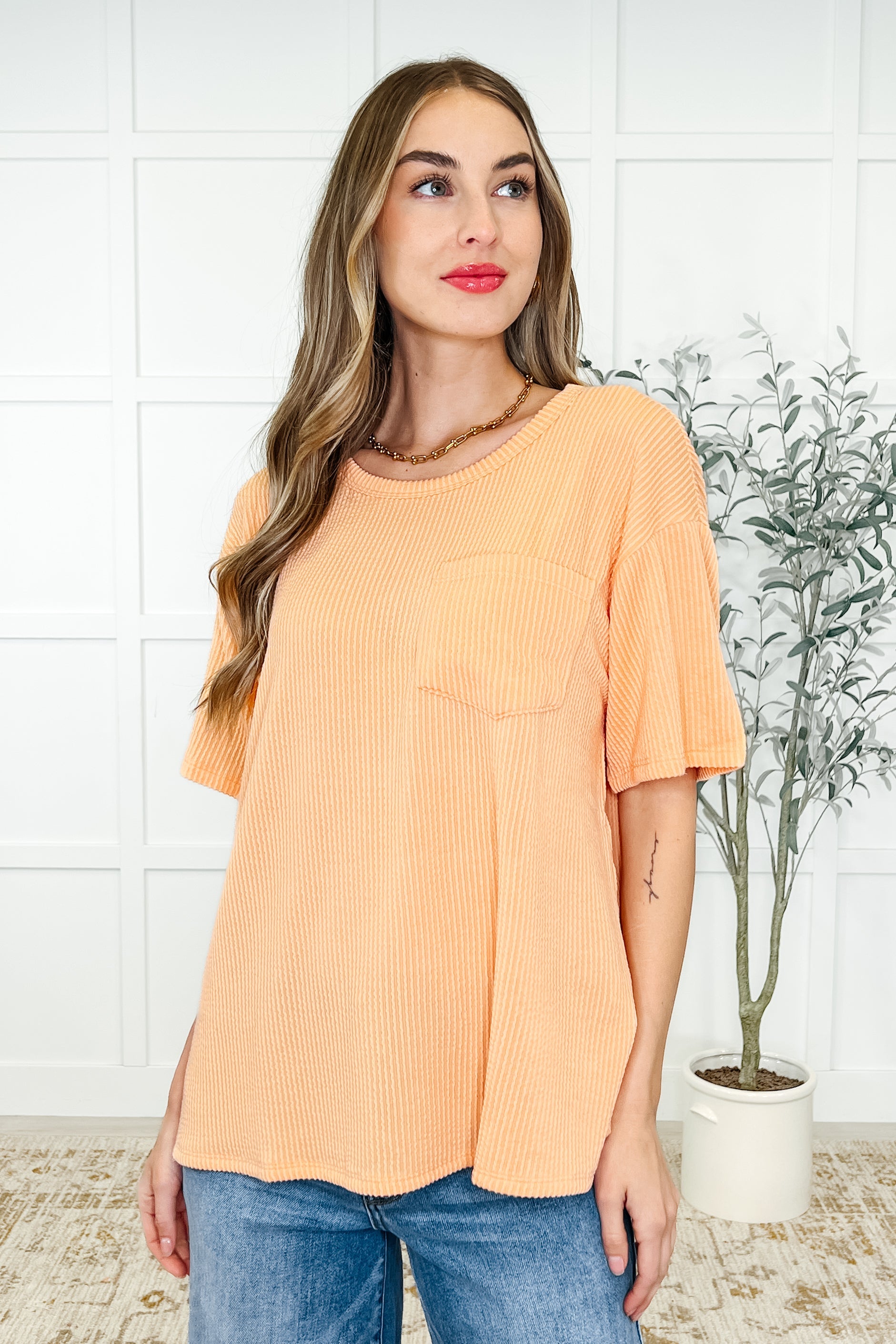 Apricot bliss tee, cable ribbed knit top, women's pocket tee, lightweight summer shirt, peach knit top, casual side slit tee, summer coral fashion, breathable women's basics.