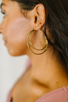 Gold double hoop earrings, layered hoop earrings, triple hoop gold earrings, geometric jewelry, statement gold earrings, comfortable hinge hoops, gold huggie hoops, modern gold jewelry.