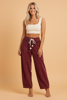 Corduroy pants, drawstring waist trousers, women's pleated pants, straight leg corduroy, high-waisted casual pants, comfortable office wear, cozy autumn fashion, relaxed fit trousers.