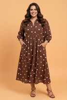 Plus size midi dress, polka dot dress with pockets, vintage style plus size fashion, retro V-neck dress, brown polka dot midi, comfortable plus size clothing, modest pocketed dress.
