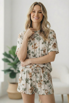 Floral lounge set, women’s matching sets, short sleeve hoodie set, boutique loungewear, floral shorts set, cozy home wear, feminine pajama set, casual summer set, floral co-ord.