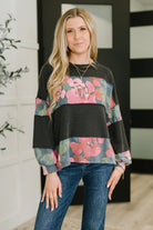 Women's contrast pullover, floral knit top, puff sleeve sweater, ribbed knit top, exposed seam detail, boutique casual wear, boho-chic pullover.