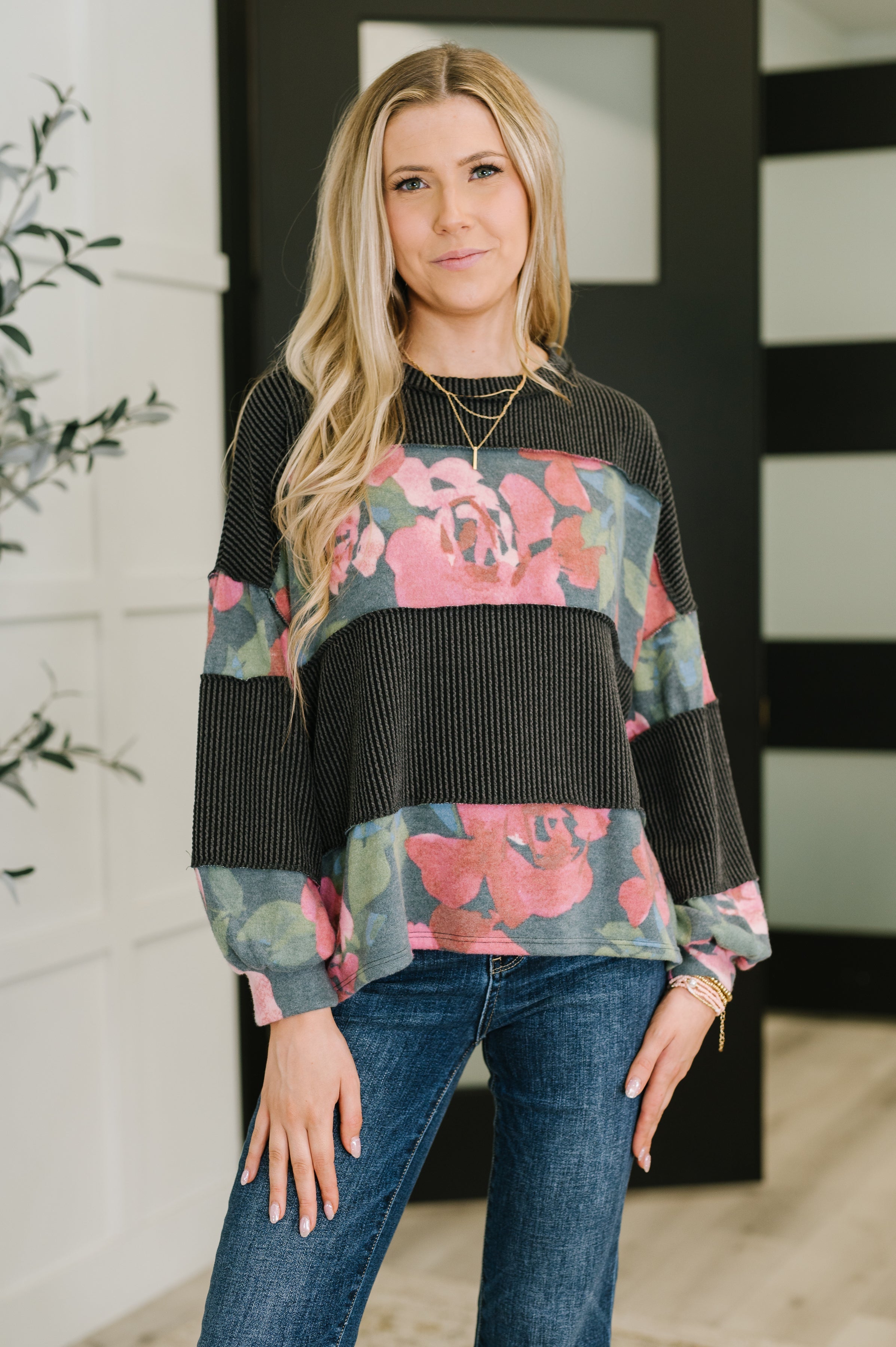 Women's contrast pullover, floral knit top, puff sleeve sweater, ribbed knit top, exposed seam detail, boutique casual wear, boho-chic pullover.