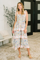 Sage floral maxi dress, smocked bodice dress, tiered ruffle dress, women’s dress with pockets, sage green summer dress, cottagecore maxi dress, adjustable tie shoulder dress, elegant tea-length dress.